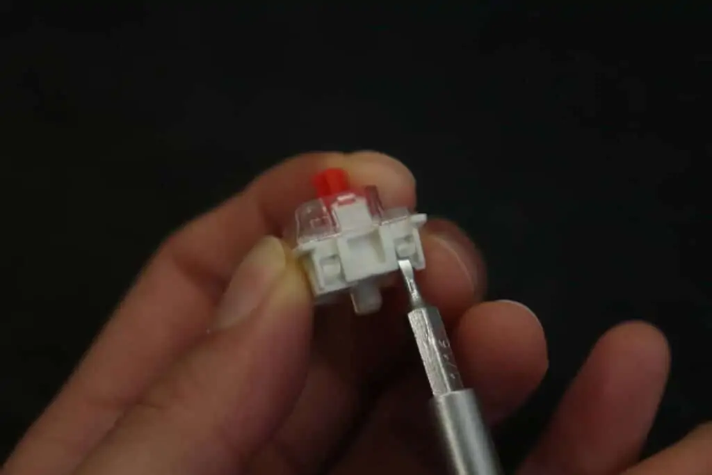 Opening a switch with a small flathead screwdriver